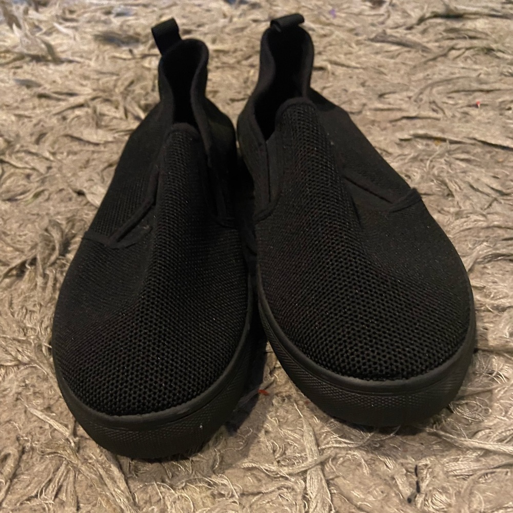 Brand new black slip ons